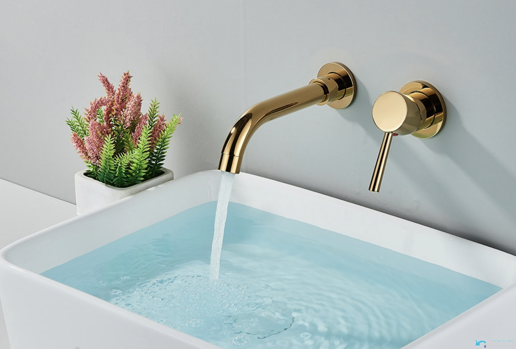 Miscelatore per lavabo a parete SG1520 in oro lucido con bocca curva e comando monoleva