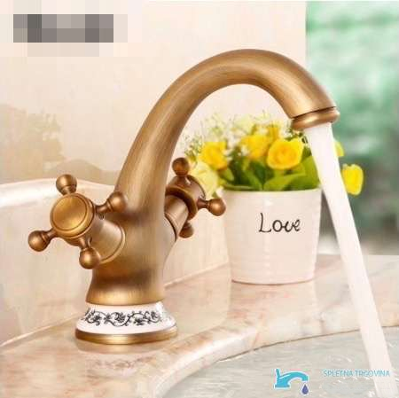 Rubinetto per lavabo UA1403 in ottone anticato con due manopole a croce e dettagli in ceramica